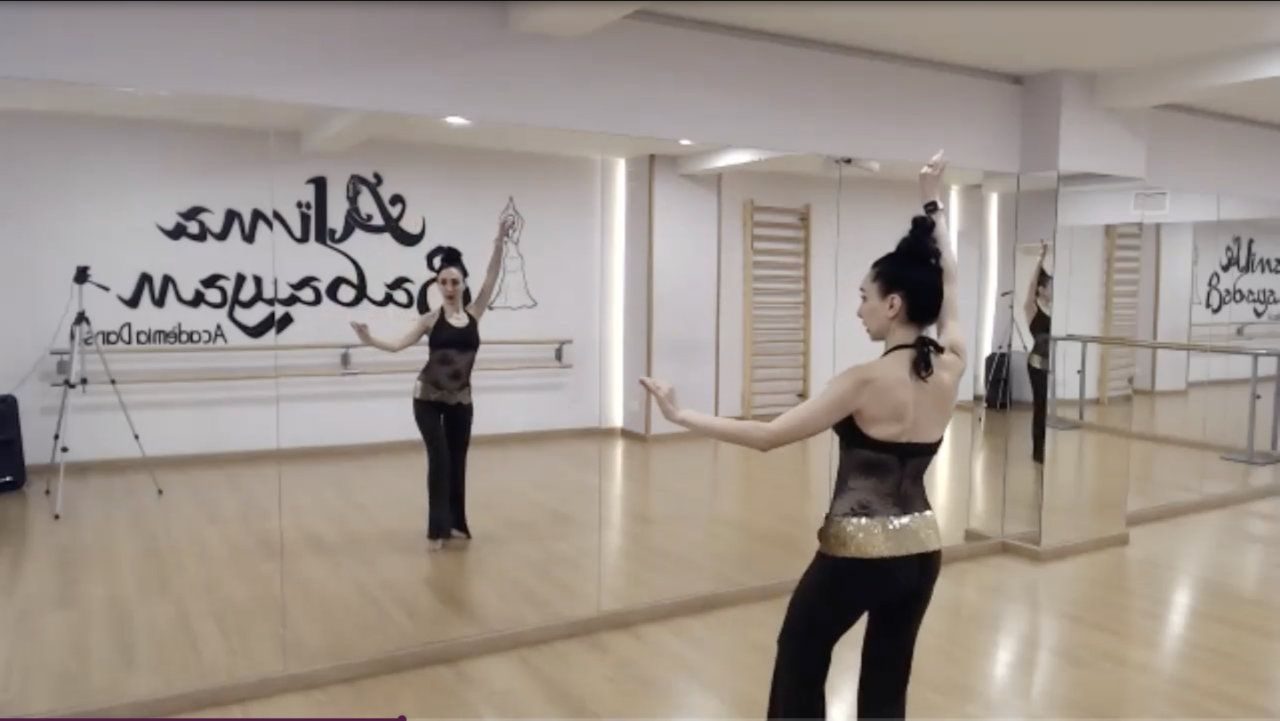 Belly dance artist performing on stage